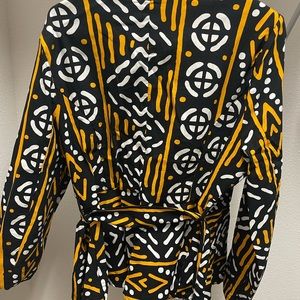 Used yellow and black white jacket suit